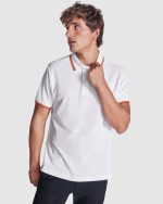 jacquard collar and cuffs with three-button placket. Reinforced covered seams in collar. Flag motif embroidered on the back.