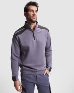 with high collar. · Reinforced covered seams on inner collar.· Contrasting shoulders and details.· Half cuff and hem in 1x1 ribbed fabric.