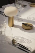 Modern cordless table lamp for hospitality and outdoor dining